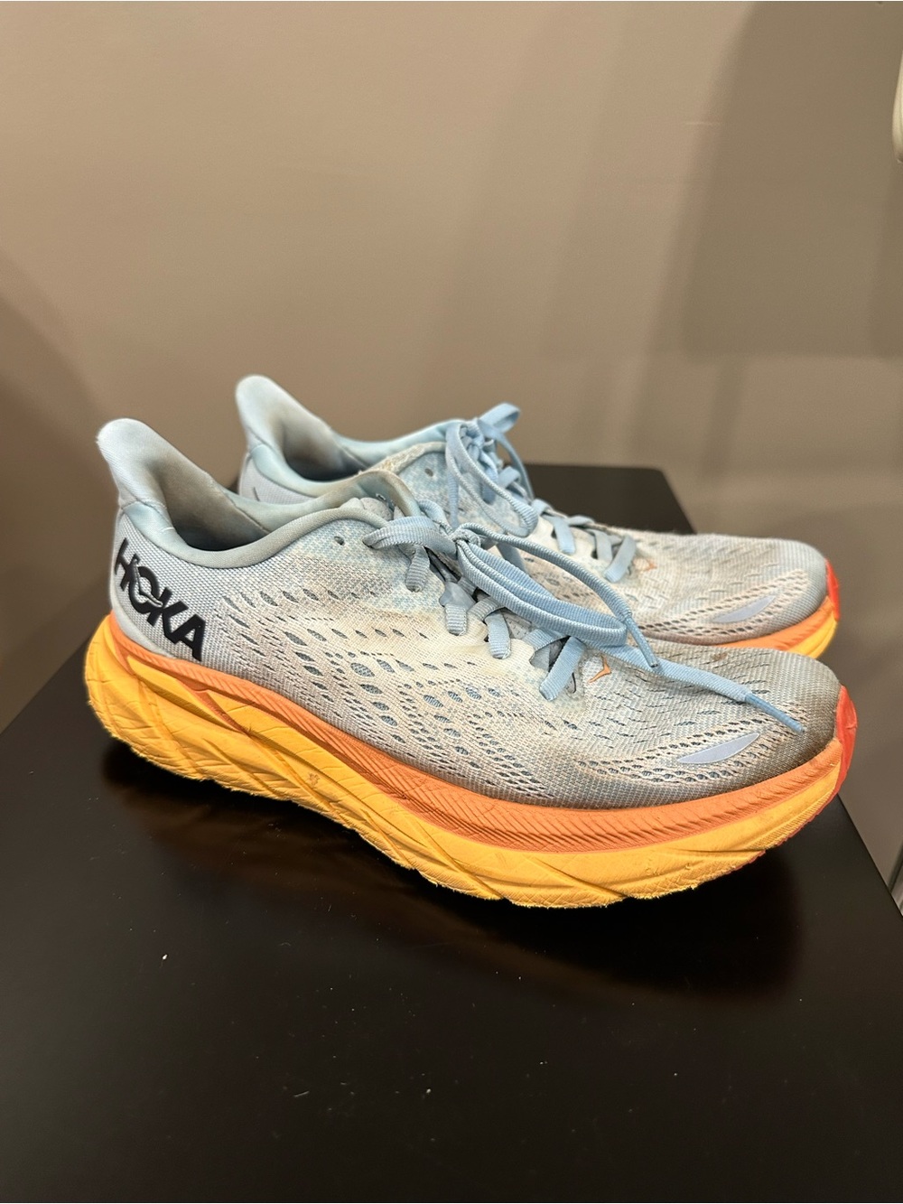 HOKA Clifton Women's Light Blue Running Shoes with Orange-Yellow Midsole